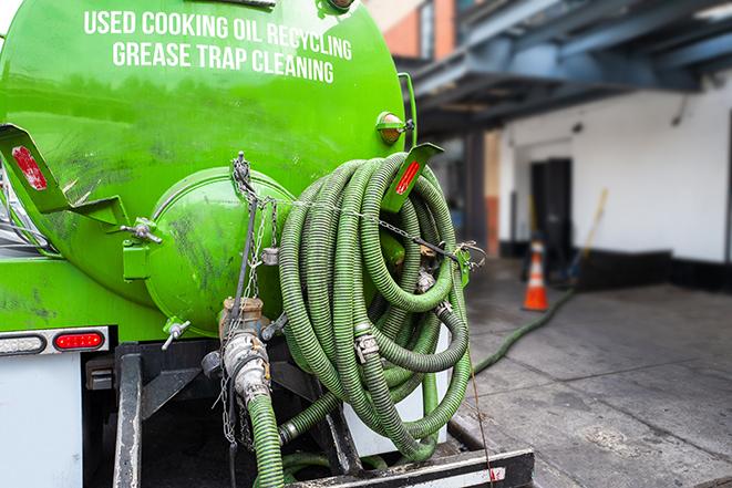 grease trap pumping service in action in Dallastown
